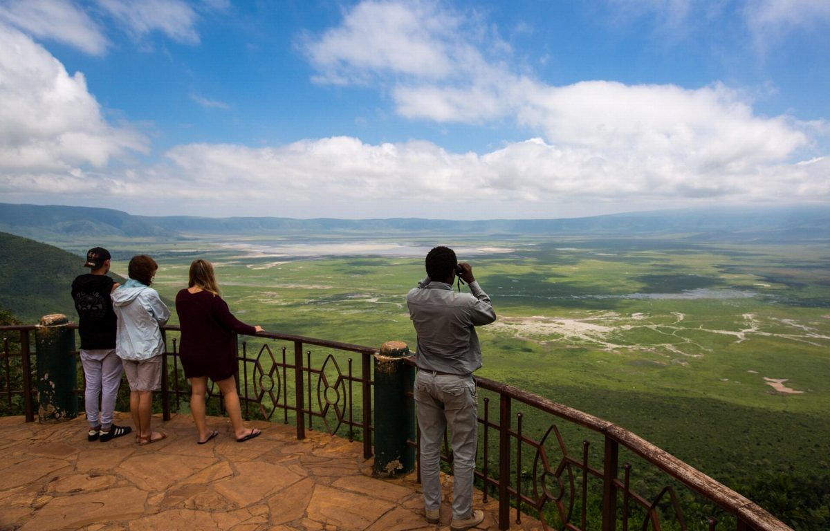 Visitors at a viewpoint looking down into the Ngorongoro Crater.
